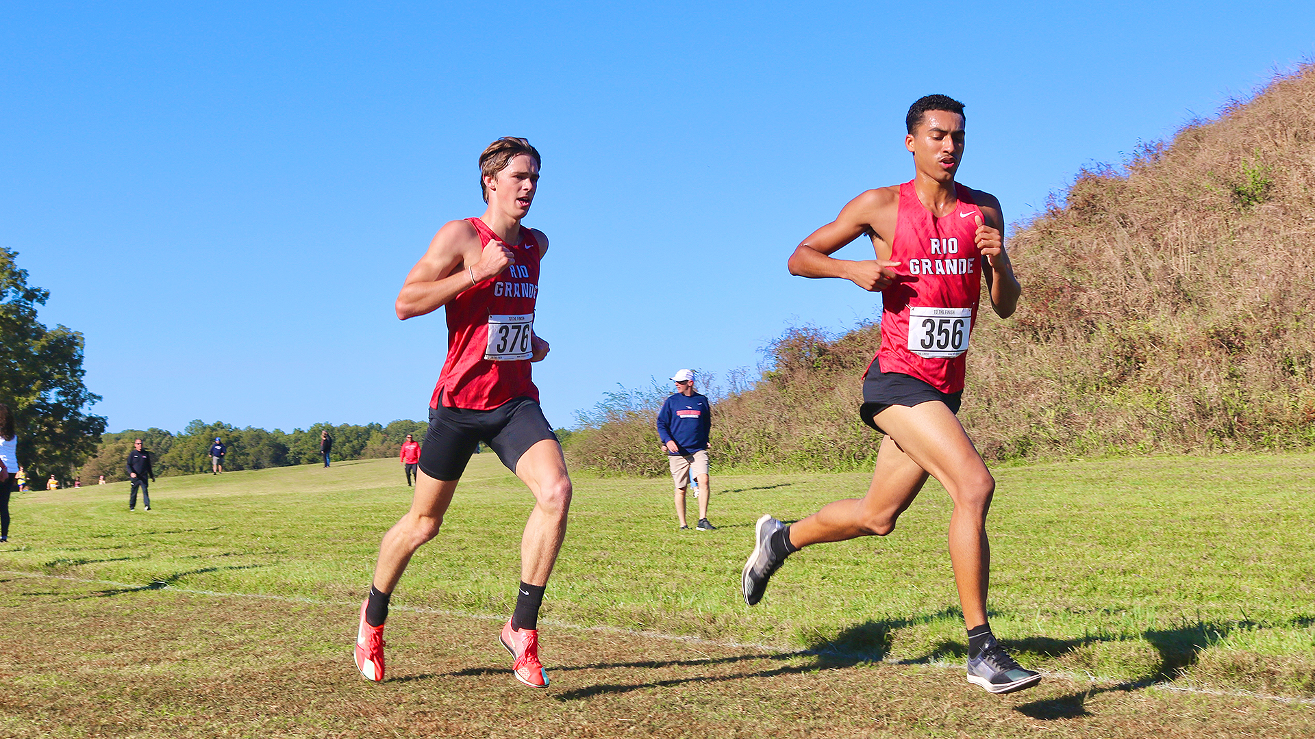 Rio Grande's Ashton Beverly (right) gave the RedStorm its top finish, taking 86th place in Friday's Angel Mounds Invitational. His teammate, John Young (left), finished 87th.