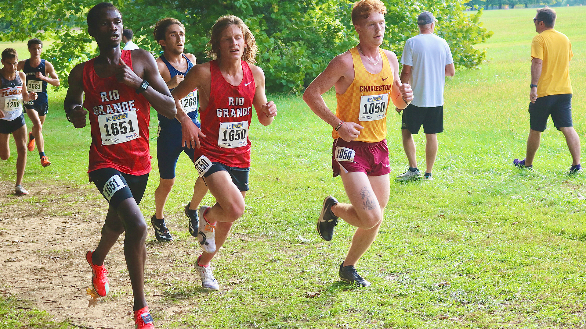 Rio Grande's Duncan Kogei (far left) and Tyler Jenkins (center) finished 38th and 40th, respectively, in Saturday's Gold Division race at the Live in Louisville Fall Classic. The RedStorm finished 15th as a team.