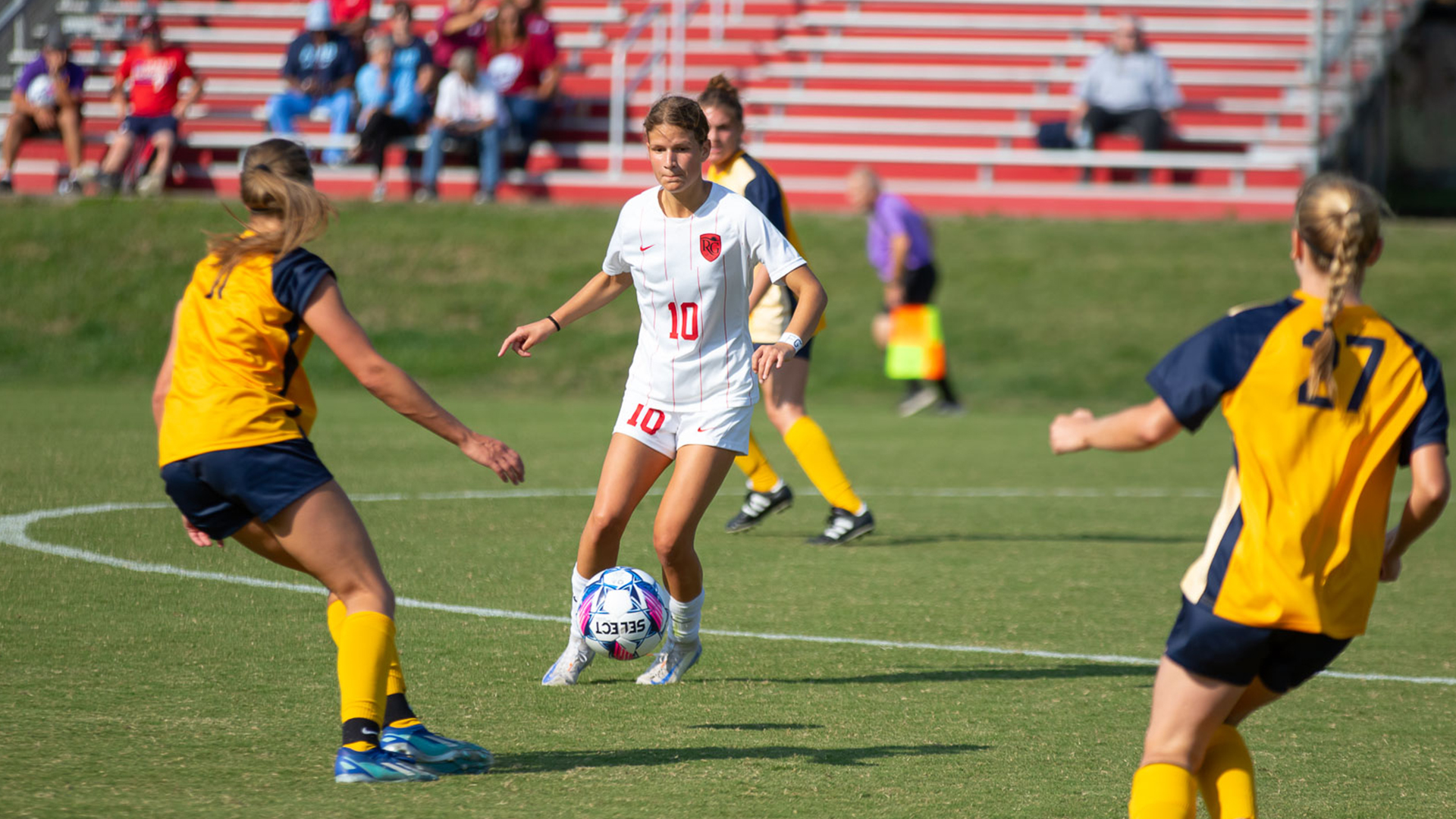 Rio Grande's Jitske De Muijnk looks for an open teammate between a pair of WVU-Tech defenders during Saturday afternoon's 1-1 tie between the two teams at Evan E. Davis Field.