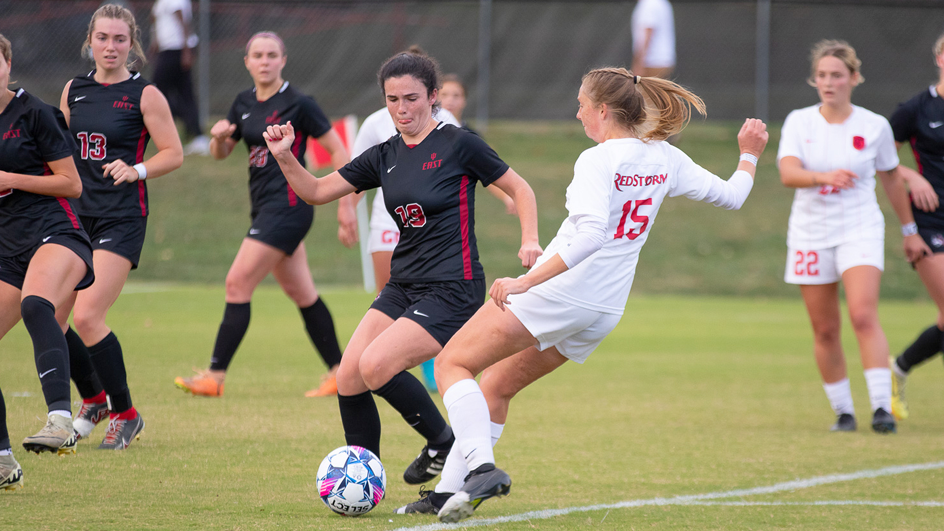 Rio's Saskia Vos tries to weave her way through a myriad of Indiana East defenders during Saturday's RSC semifinal round matchup at Evan E. Davis Field. The Red Wolves topped the RedStorm, 1-0.