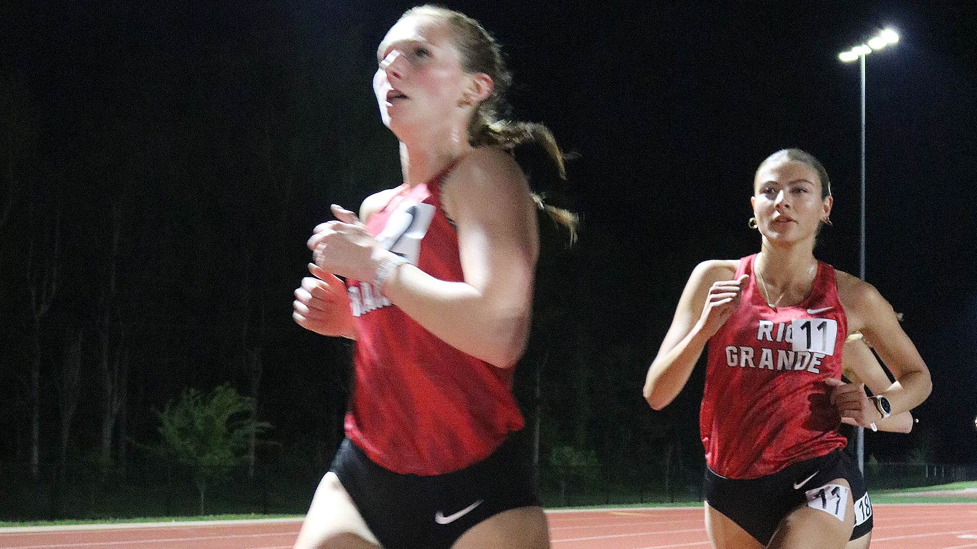 Rio Grande's Mackenzie McCarthy (left) and Amarissa Kerns (right) participate in the 10,000-meter run during Friday's action at the Lee University Fast Break Invitational in Cleveland, Tenn.